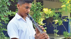 Preparación. El estudiante ha dedicado un año aproximadamente a practicar las notas musicales del himno salvadoreño.