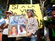 Personas participan en un homenaje a los activistas asesinados por oponerse a proyectos mineros, este domingo en San Isidro (El Salvador) EFE/ Rodrigo Sura